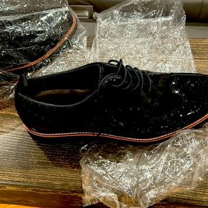 Brand new pair of Marc Nolans, black patent leather shoes